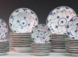 a lot of plates stacked on top of each other