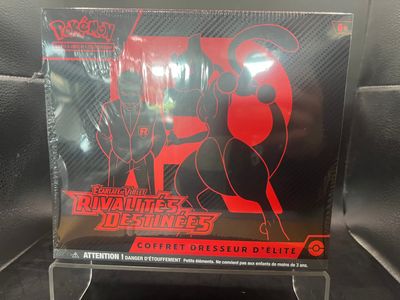 anime figure display case with a red and black poster on it