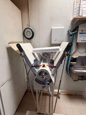 a machine that is sitting on a stand in a room