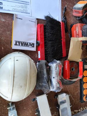 a lot of tools that are laying out on the floor