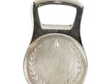 a silver bottle opener with a laurel design on it