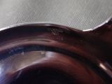 a close up view of a metal object on a table