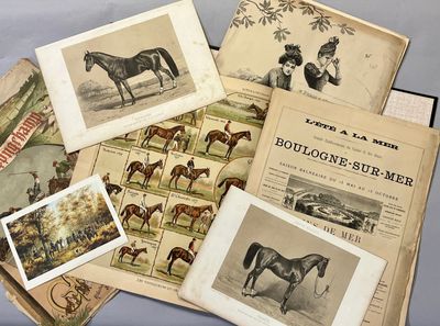 a lot of old books with pictures of horses on them