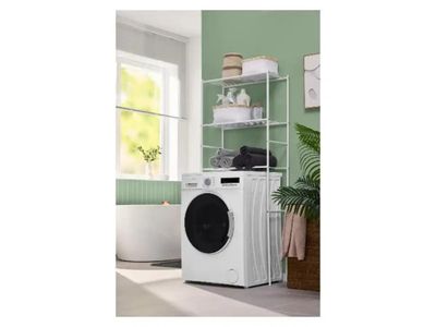 une photo d'un lave-linge et d'un sèche-linge blancs dans une pièce