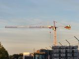 a large crane that is sitting on top of a building