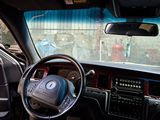 a picture of a car with a steering wheel and dashboard