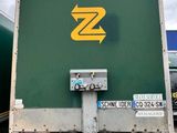 a green box truck with a yellow z logo on it