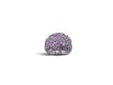 a close up of a ring with pink and blue stones on it