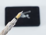 a pen that is sitting on top of a table