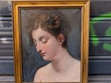 a picture of a painting of a woman in a gold frame