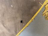 an image of a close up of a piece of cloth on a table