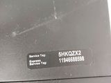 an image of a close up of a laptop with a sticker on it