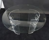 Table ronde en verre. (photo 2)