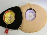 two hats that are sitting on top of each other