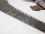 a wrenet and a pair of pliers on a table