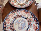two plates that are sitting on a table