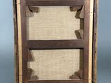 an old wooden picture frame with a piece of wood in the middle