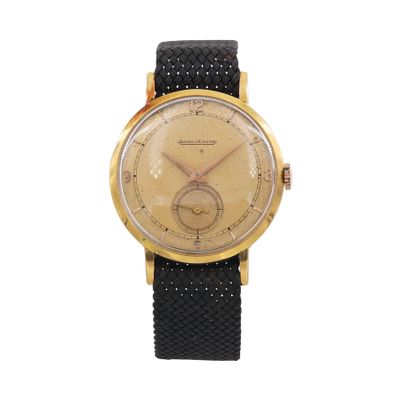 a close up of a watch on a white background with a white background