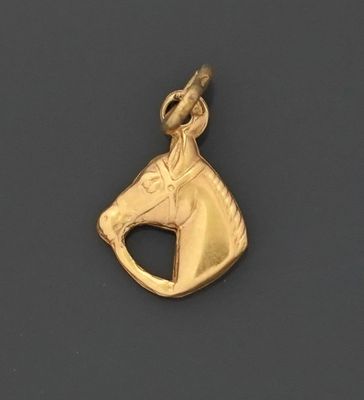 Pendentif en or jaune 18K 750 millièmes figurant une tête de…