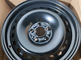 a close up of a wheel in a box with a cardboard box