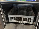 a dishwasher with a lot of dishes inside of it
