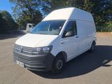 a white van that is parked in a parking lot