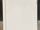 an image of a white refrigerator with a blue sticker on the door