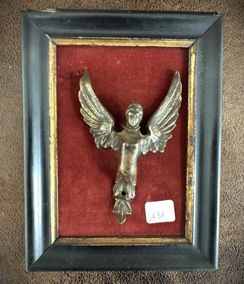 an image of a picture of a bird with wings in a frame
