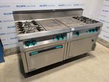 une photo d'une cuisinière équipée de deux feux et de deux fours