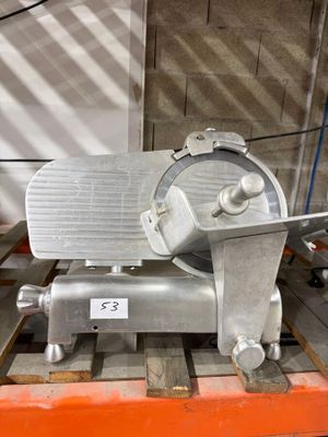 a machine that is sitting on a pallet in a warehouse