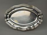 a silver tray that is sitting on a table