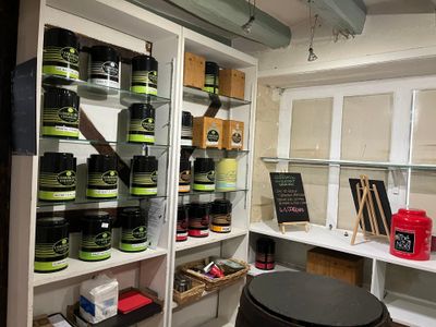 a room with a shelf full of different types of products