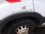 a white van with a red stripe on the side of it