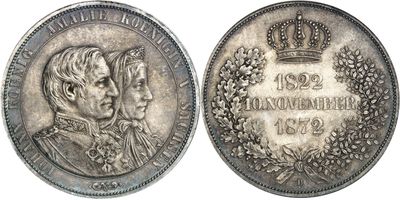 a close up of a coin with a crown on top of it
