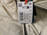 a label on a jacket that is attached to it