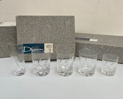 four glasses and a box on the table