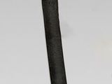 a very old looking dagger that is on display