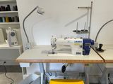 a sewing machine sitting on a table in a room