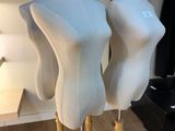 two mannequins that are on display in a room