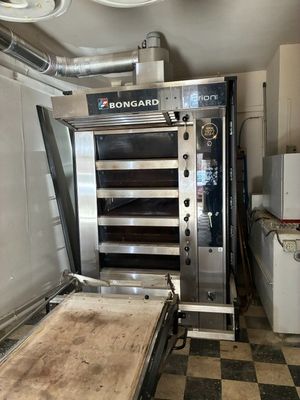 a large oven that is sitting inside of a kitchen