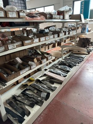 many different types of tools on the shelves in the store