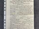 a close up of a piece of paper with writing on it