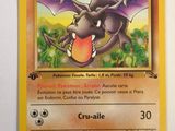 a close up of a pokemon card with a dragon on it