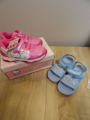 a pair of shoes and a box on a table