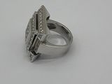 an image of a diamond ring on a white surface