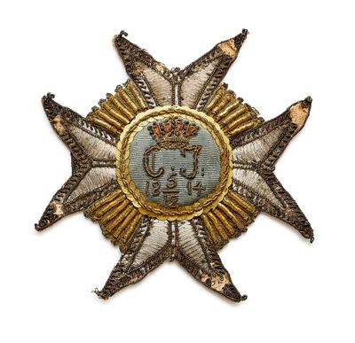 une image d'une étoile surmontée d'une couronne