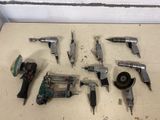 a lot of tools that are laying out on the floor