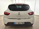 a picture of a white car in a showroom