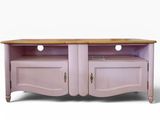 lavender painted tv stand with two doors and drawers