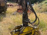 an image of a large excavator in a field